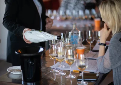 A person pouring champagne